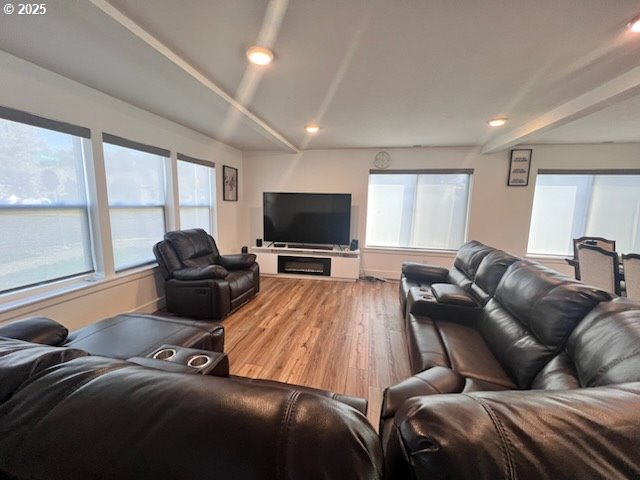 17095 SE Manley St, Portland, OR 97236 - living area featuring wood finished floors, healthy amount of natural light, and recessed lighting