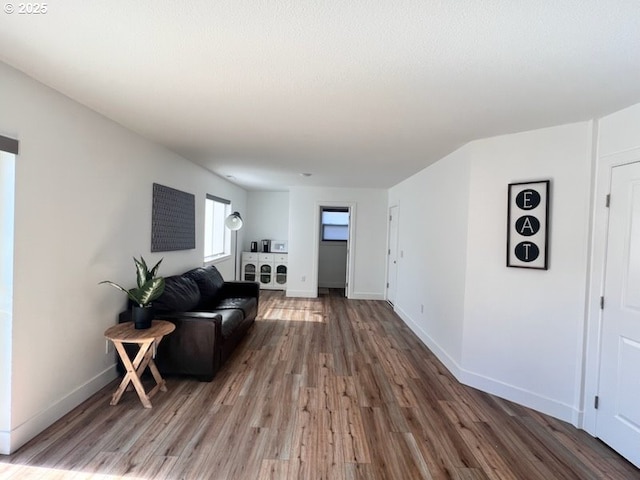 17095 SE Manley St, Portland, OR 97236 - living room featuring wood finished floors and baseboards