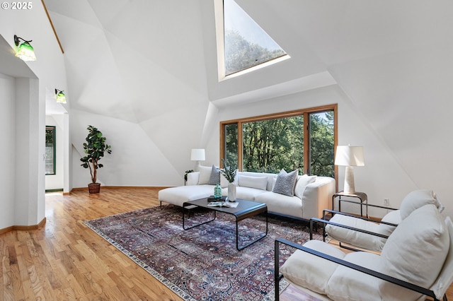 7210 NW Grandview Dr, Corvallis, OR 97330 - living room with wood finished floors, a skylight, and high vaulted ceiling