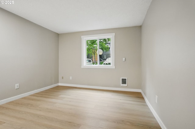 12620 NW Barnes Rd Unit 4, Portland, OR 97229 - unfurnished room featuring light wood-type flooring and baseboards