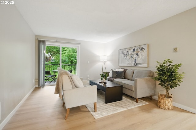 12620 NW Barnes Rd Unit 4, Portland, OR 97229 - living area with light wood-type flooring and baseboards