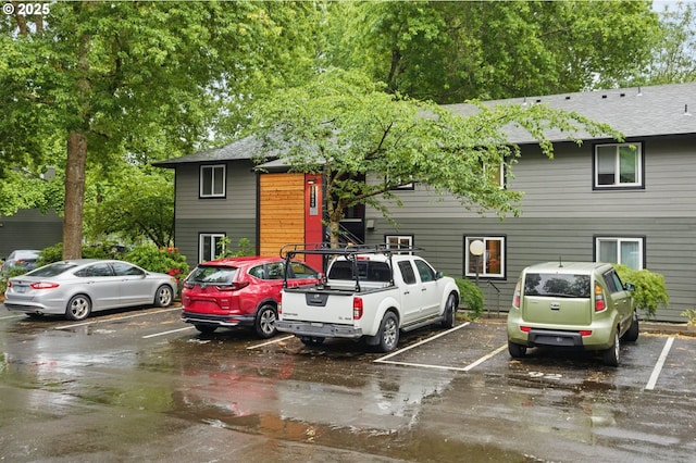 12620 NW Barnes Rd Unit 4, Portland, OR 97229 - view of front of home with uncovered parking and a shingled roof