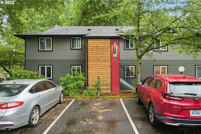 12620 NW Barnes Rd Unit 4, Portland, OR 97229 - townhome / multi-family property featuring uncovered parking, brick siding, and a shingled roof