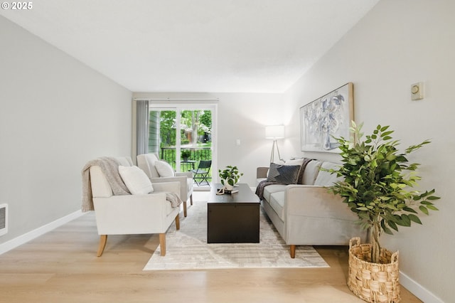 12620 NW Barnes Rd Unit 4, Portland, OR 97229 - living area featuring wood finished floors and baseboards