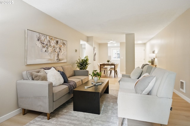 12620 NW Barnes Rd Unit 4, Portland, OR 97229 - living room with light wood finished floors and baseboards
