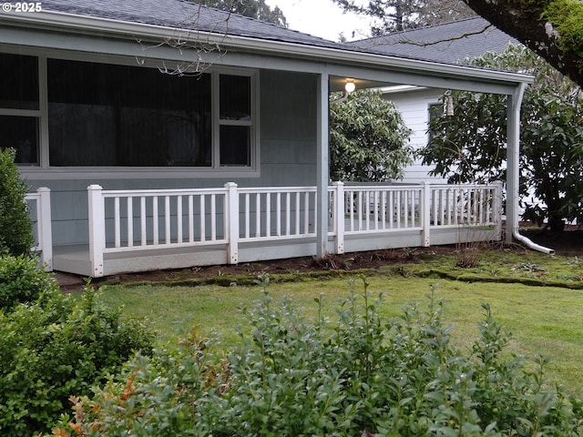 view of property exterior featuring a lawn