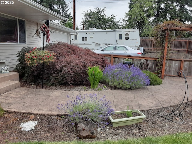 view of yard with a garage