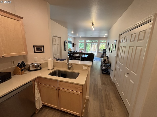 1690 32nd St, Florence, OR 97439 - kitchen featuring dishwasher, a peninsula, open floor plan, and light countertops