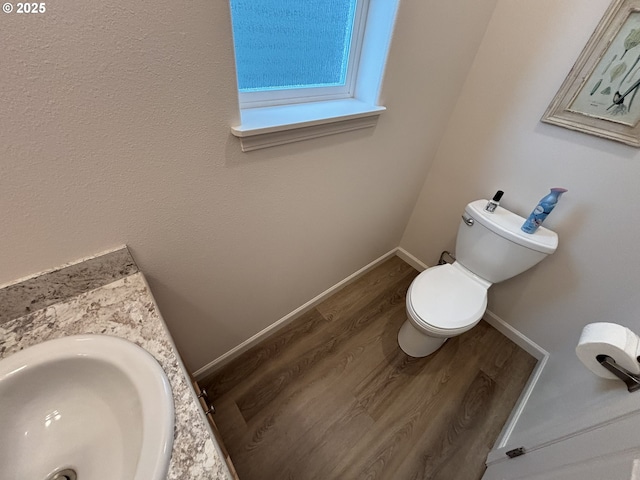 1690 32nd St, Florence, OR 97439 - bathroom with wood finished floors and vanity