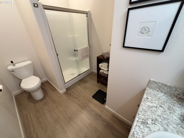 1690 32nd St, Florence, OR 97439 - full bath featuring wood finished floors, a stall shower, and vanity