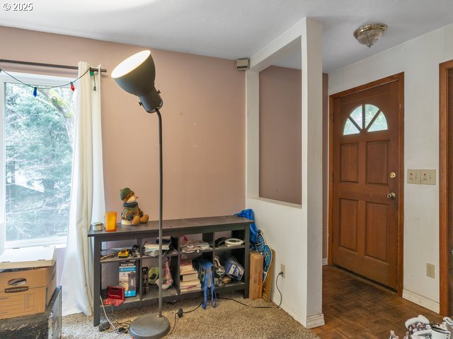 foyer with baseboards