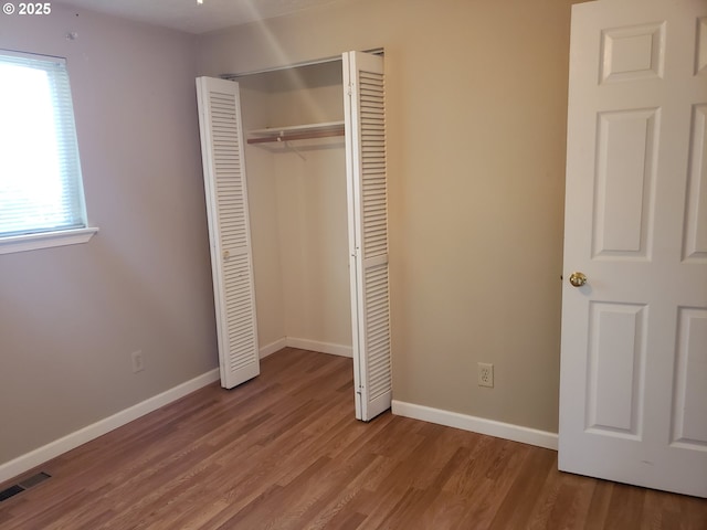 unfurnished bedroom featuring light hardwood / wood-style floors