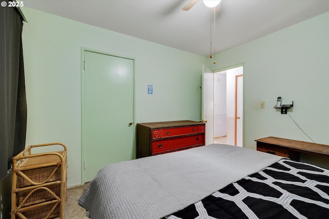 bedroom featuring carpet flooring and a ceiling fan