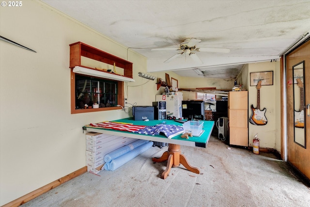 dining room with a ceiling fan, baseboards, and carpet floors