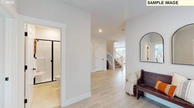 corridor featuring light hardwood / wood-style flooring