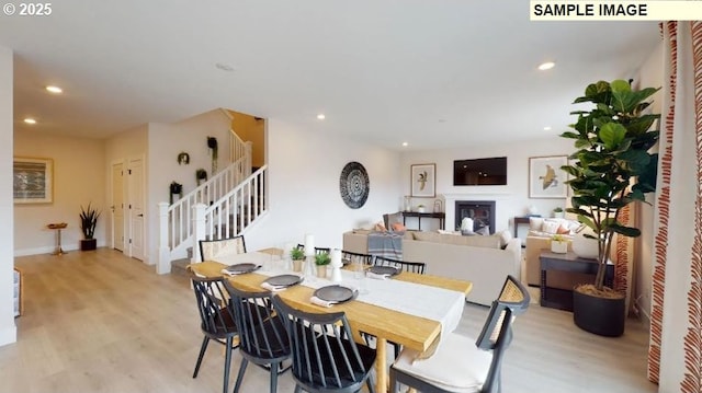 dining space featuring light hardwood / wood-style flooring