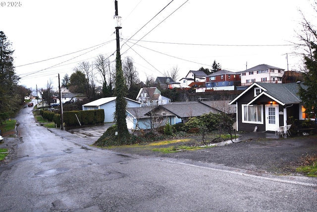 view of road featuring a residential view