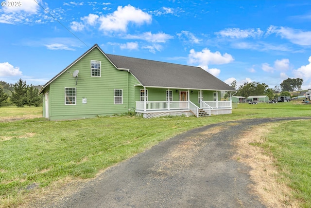 222 Twin Springs Ln, Roseburg, OR 97470 - view of front of home featuring a porch, driveway, and a front yard