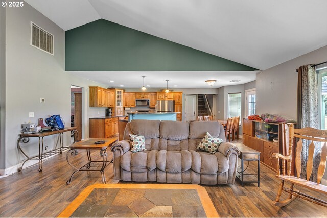 222 Twin Springs Ln, Roseburg, OR 97470 - living room with high vaulted ceiling, wood finished floors, and recessed lighting