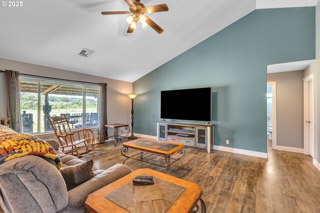 222 Twin Springs Ln, Roseburg, OR 97470 - living area featuring high vaulted ceiling, wood finished floors, a ceiling fan, and baseboards