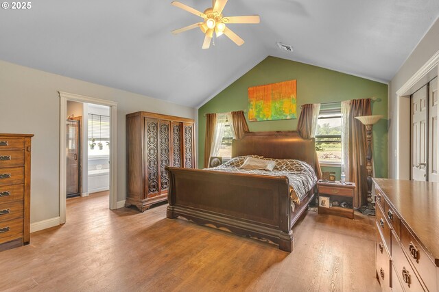 222 Twin Springs Ln, Roseburg, OR 97470 - bedroom featuring light wood-style flooring, lofted ceiling, a ceiling fan, and baseboards