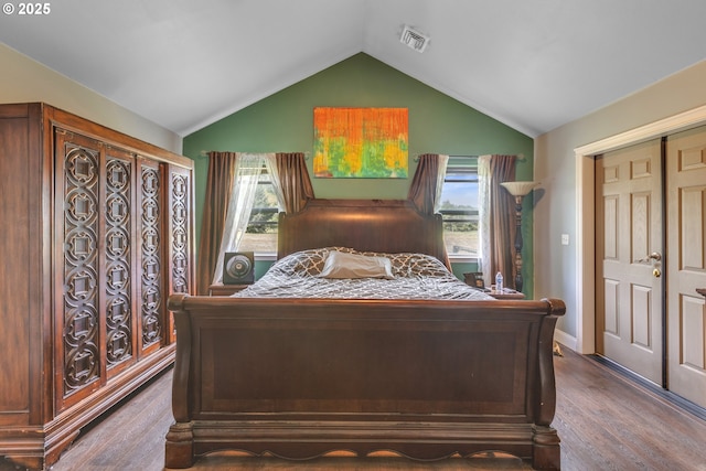 222 Twin Springs Ln, Roseburg, OR 97470 - bedroom with dark wood-style floors and vaulted ceiling