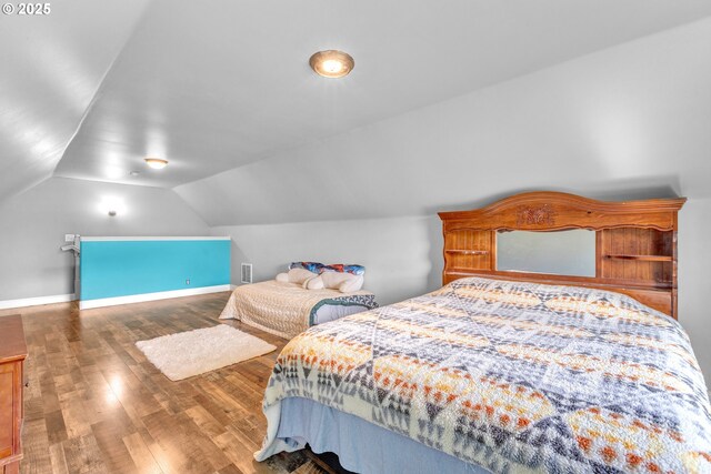 222 Twin Springs Ln, Roseburg, OR 97470 - bedroom featuring wood finished floors and lofted ceiling