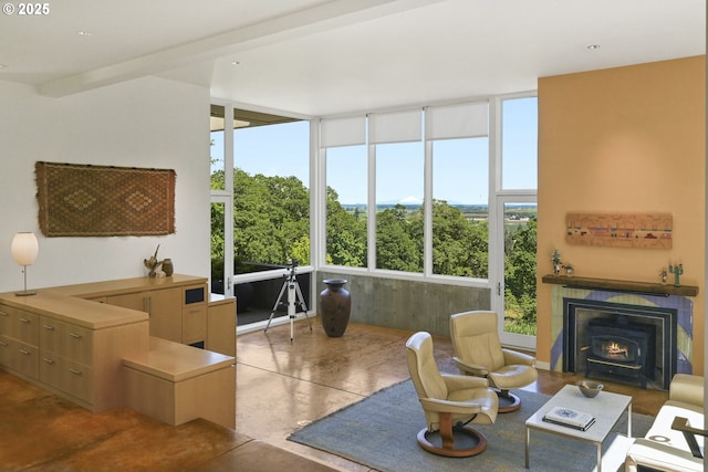 living room with floor to ceiling windows, healthy amount of natural light, and a tiled fireplace