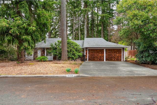 view of front of property with roof with shingles