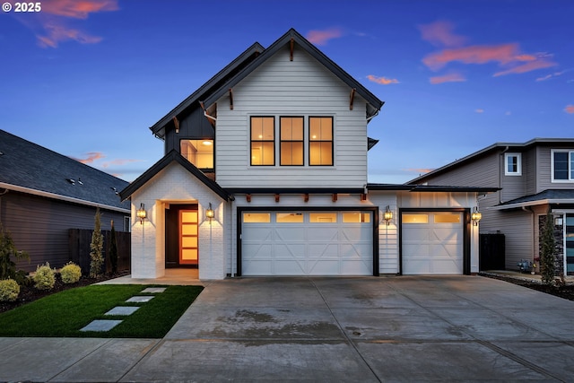 traditional home with concrete driveway, board and batten siding, and a garage
