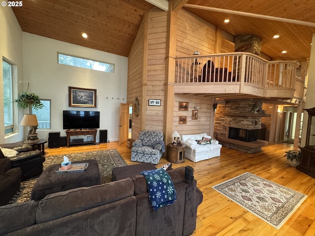 31640 Spruce Dr, Gold Beach, OR 97444 - living room with recessed lighting, wood-type flooring, high vaulted ceiling, wood ceiling, and a fireplace