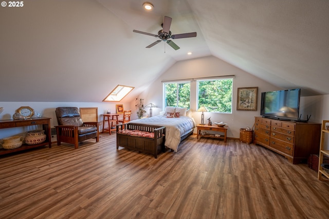 bedroom featuring vaulted ceiling and wood finished floors