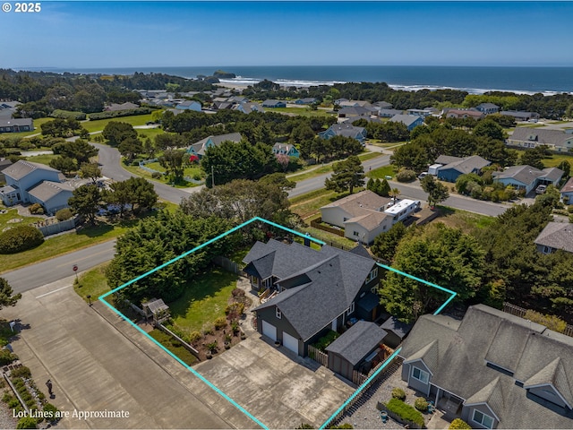 aerial view featuring a residential view and a water view