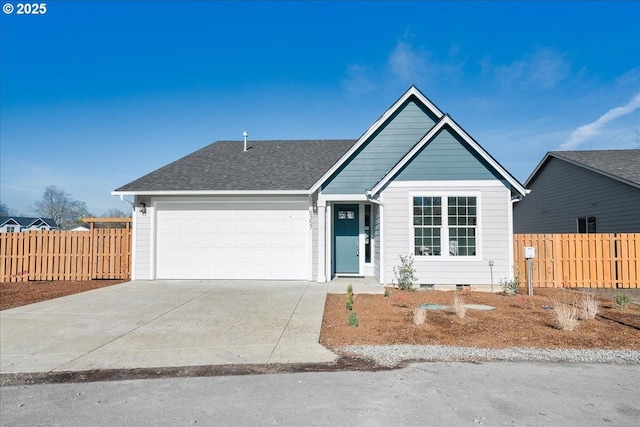 view of front of property with a garage