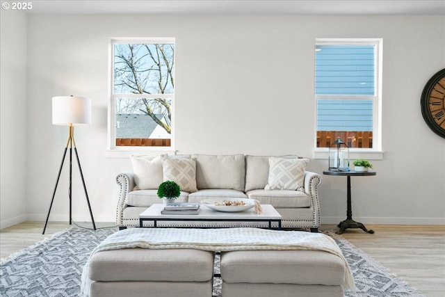 living room with light hardwood / wood-style floors