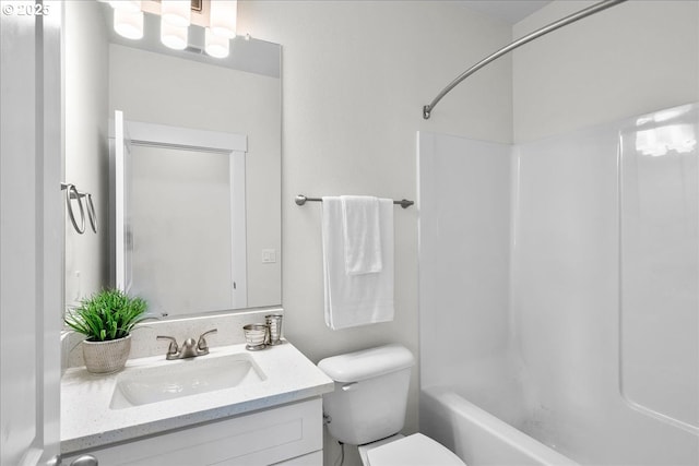 full bathroom with washtub / shower combination, toilet, and vanity