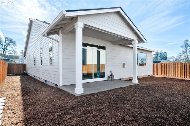 rear view of house with a patio