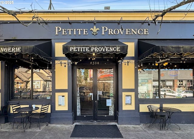 property entrance featuring french doors