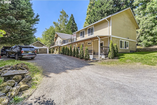 16500 SW Satterberg Rd, Beaverton, OR 97007 - view of front of property with covered porch, an outbuilding, and a garage