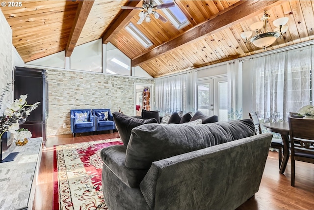 16500 SW Satterberg Rd, Beaverton, OR 97007 - living area with a ceiling fan, beamed ceiling, wood finished floors, healthy amount of natural light, and wooden ceiling