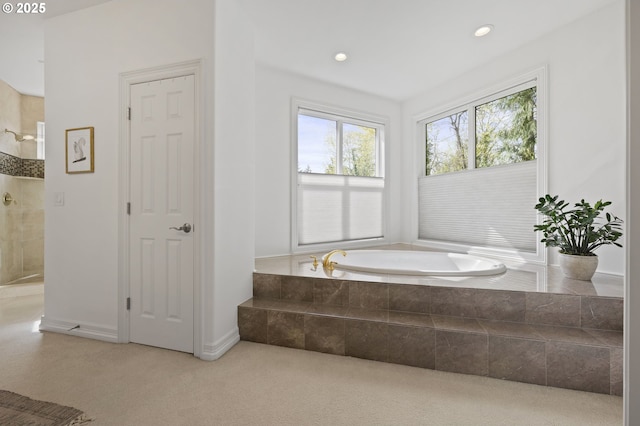 full bathroom featuring a bath, recessed lighting, and tiled shower