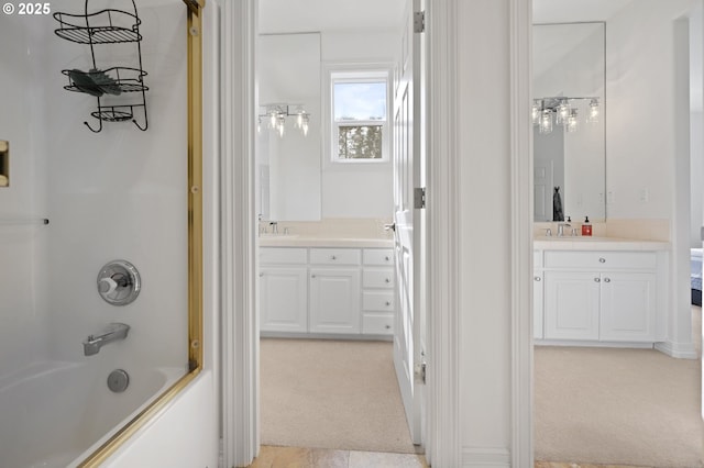 bathroom featuring vanity and shower / bathing tub combination