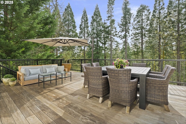 deck featuring an outdoor living space and outdoor dining area