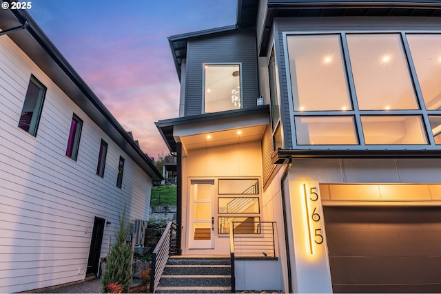 565 W U St, Washougal, WA 98671 - view of front of house featuring a garage