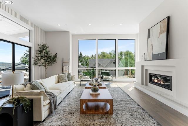 565 W U St, Washougal, WA 98671 - living room with a glass covered fireplace, recessed lighting, and wood finished floors