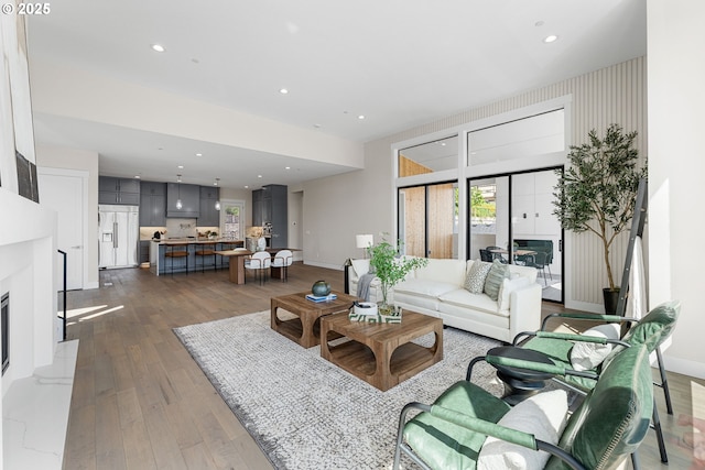 565 W U St, Washougal, WA 98671 - living room featuring recessed lighting, dark wood-style flooring, and baseboards