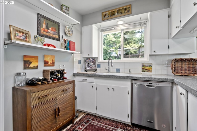 6985 SW Florence Ln, Portland, OR 97223 - kitchen featuring stainless steel dishwasher, white cabinetry, decorative backsplash, and light countertops