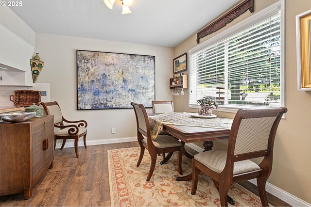 6985 SW Florence Ln, Portland, OR 97223 - dining area featuring wood finished floors and baseboards
