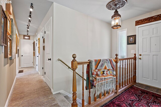 6985 SW Florence Ln, Portland, OR 97223 - foyer entrance featuring baseboards and track lighting