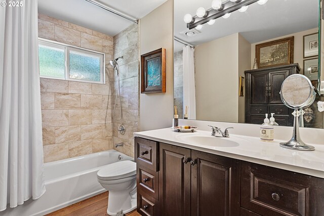 6985 SW Florence Ln, Portland, OR 97223 - full bathroom with shower / bathtub combination with curtain, wood finished floors, and vanity